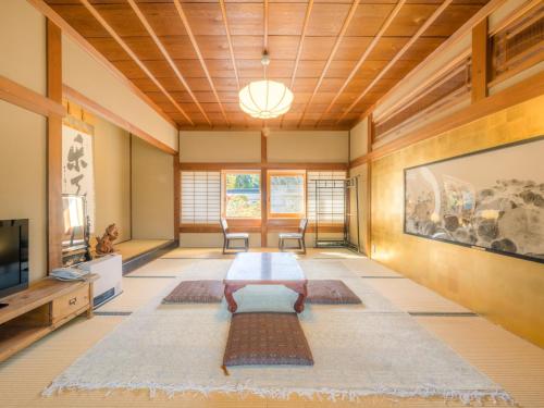 Postel nebo postele na pokoji v ubytování 高野山 宿坊 恵光院 -Koyasan Syukubo Ekoin Temple-