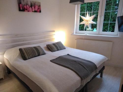 Posteľ alebo postele v izbe v ubytovaní Mizerówka Guest House