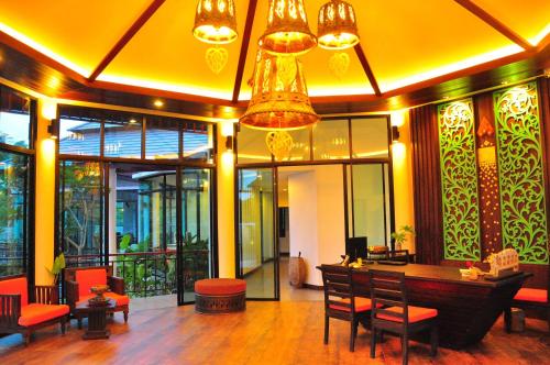 Posezení v ubytování Navatara Phuket Resort