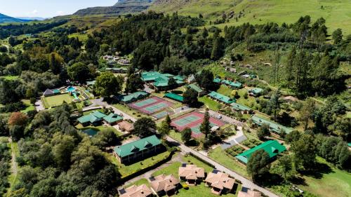 an aerial view of a village in the mountains at Gooderson Drakensberg Gardens Golf & Spa Resort in Drakensberg Garden