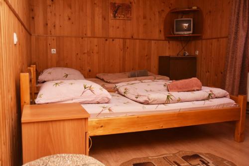 Ліжко або ліжка в номері Guest House Mandrivnyi Rooms&Apartments