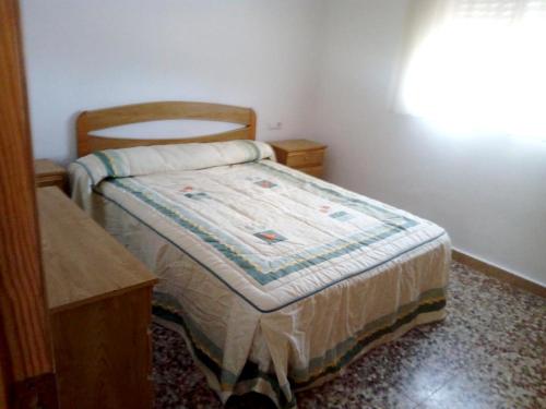 Letto o letti in una camera di 2 bedrooms house with shared pool and enclosed garden at Cartagena