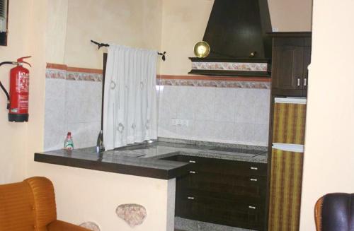 Dapur atau dapur kecil di 4 bedrooms villa with private pool terrace and wifi at Mesas de Guadalora
