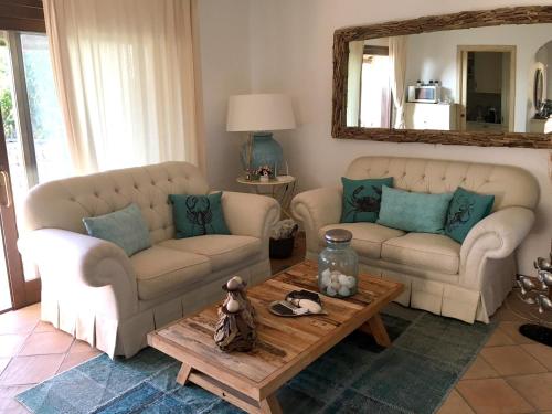 Posezení v ubytování Enchanting Villa in Palau with Private Pool