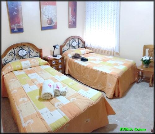 Cama o camas de una habitación en 2 bedrooms appartement with city view and furnished terrace at Benicarlo 1 km away from the beach