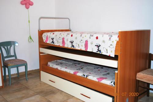 Ένα ή περισσότερα κρεβάτια σε δωμάτιο στο Charming house in Locorotondo, enclosed garden