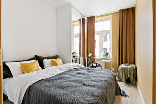 Postel nebo postele na pokoji v ubytování BJØRVIKA APARTMENTS - Solli