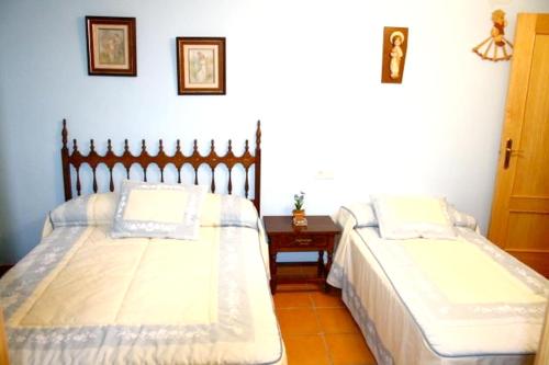 Gulta vai gultas numurā naktsmītnē 3 bedrooms appartement with shared pool and enclosed garden at La Iruela