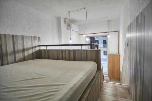 Postel nebo postele na pokoji v ubytování KM33 Apartments - Budapest - hostAID