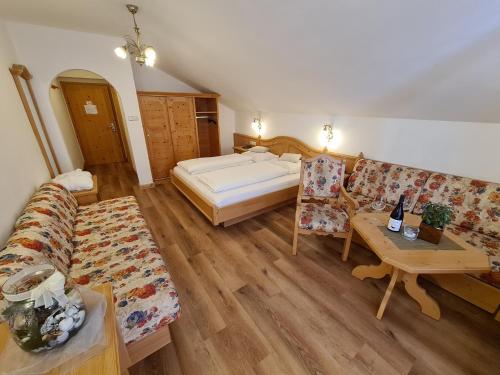 Letto o letti in una camera di Sporthotel Kalcherhof