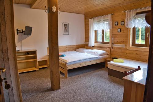 Postel nebo postele na pokoji v ubytování Penzion Pohádka