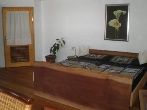 Ένα ή περισσότερα κρεβάτια σε δωμάτιο στο Wampendobler Paradies