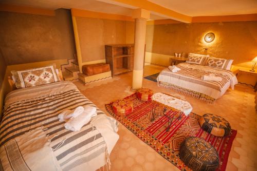 Ένα ή περισσότερα κρεβάτια σε δωμάτιο στο Takojt