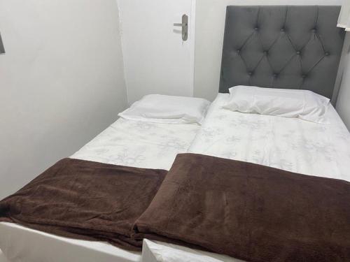 Tempat tidur dalam kamar di Apartamento Mobiliado Temporada