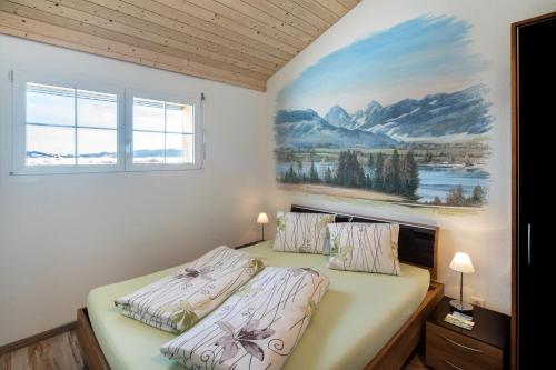 
Ein Bett oder Betten in einem Zimmer der Unterkunft B&B Ferienhof am See
