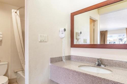 
A bathroom at Americas Best Value Inn and Suites Flagstaff
