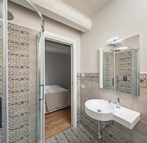 a bathroom with a sink and a shower at Podere GIUSTI in Reggello