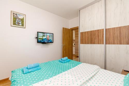 Postel nebo postele na pokoji v ubytování Nirvana 06