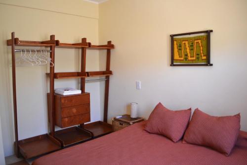 Ліжко або ліжка в номері Kamay Apart Cafayate