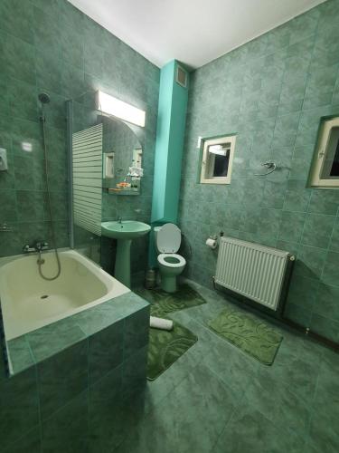 Een badkamer bij Bonton Rooms