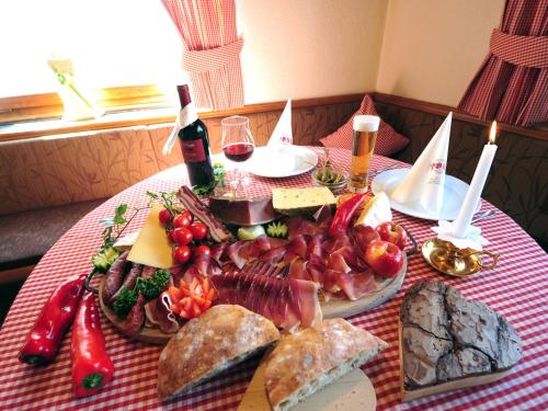 a plate of food on top of a table at Hotel Traube in Fliess