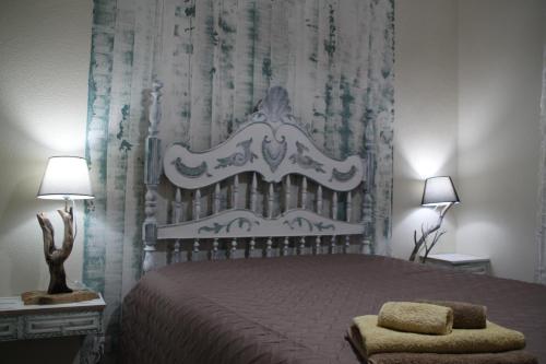 Кровать или кровати в номере Casas do patrao I
