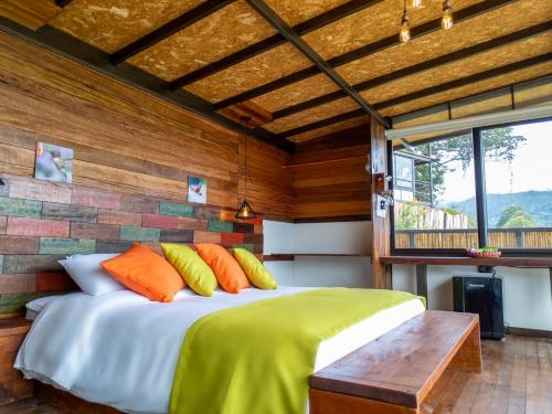 Letto o letti in una camera di Natubri Ecohotel