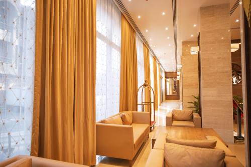 Χώρος καθιστικού στο Bilitom Hotel