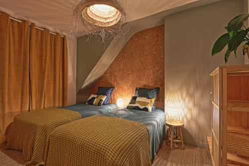 Ein Bett oder Betten in einem Zimmer der Unterkunft sangatte " Les Terrasses" maison front de mer Les pieds dans l'eau pleine de charme Cap Blanc Nez Côte d'Opale