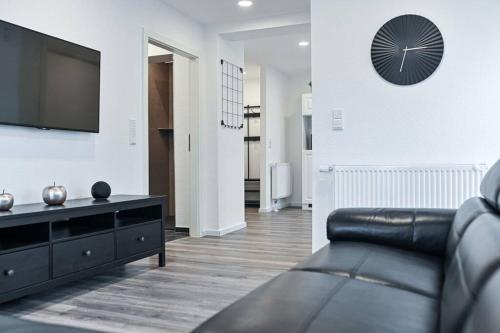 Μια τηλεόραση ή/και κέντρο ψυχαγωγίας στο Ferienhaus Kopf in Bad Buchau
