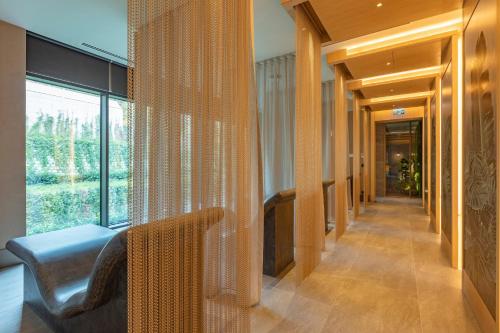 a hallway in a building with a window at NG Enjoy in Sapanca