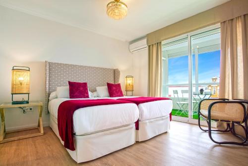 Posteľ alebo postele v izbe v ubytovaní Genteel Home San Pablo