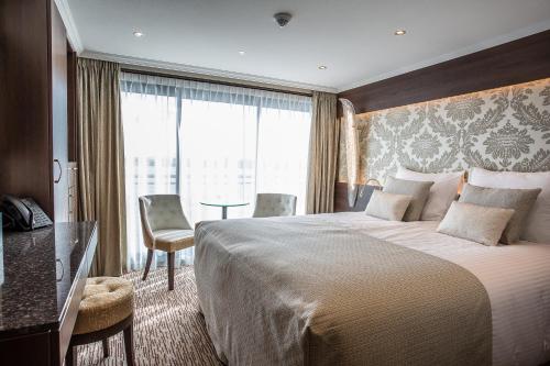 En eller flere senge i et værelse på VIVA RIVERSIDE Altstadt Düsseldorf