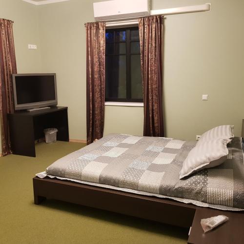 Μια τηλεόραση ή/και κέντρο ψυχαγωγίας στο Goodwin Guest House