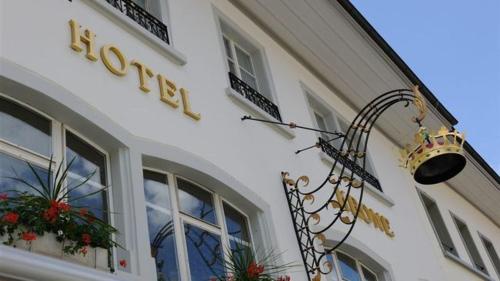 a building with a sign on the side of it at Hotel Krone in Wangen an der Aare