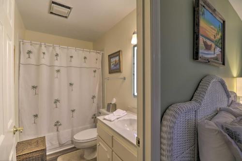 a bathroom with a sink and a toilet and a shower at 4 Mi to Lake Unit with Pool Access in Fairfield Bay in Fairfield Bay