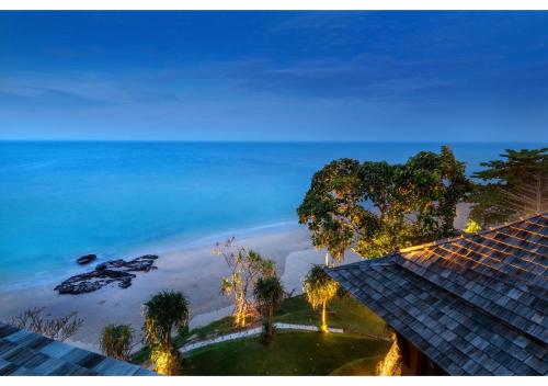 a view of the beach from a resort at Nirvana Beach Resort, Koh Lanta SHA Extra Plus in Ko Lanta