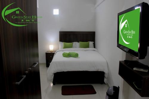 Katil atau katil-katil dalam bilik di Green Stay house