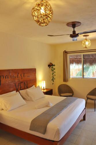 Cama o camas de una habitación en Hotel Sur Bacalar