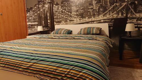 Łóżko lub łóżka w pokoju w obiekcie Apartamenty nad Stonehenge