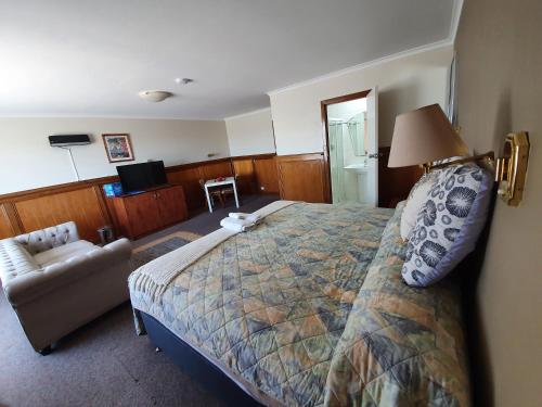 Un ou plusieurs lits dans un hébergement de l'établissement Robe Haven Motel