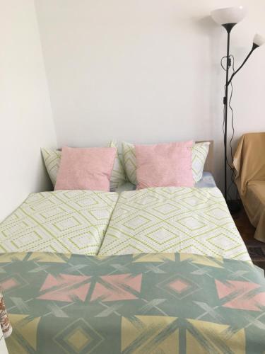 Кровать или кровати в номере China-Ferienzimmer