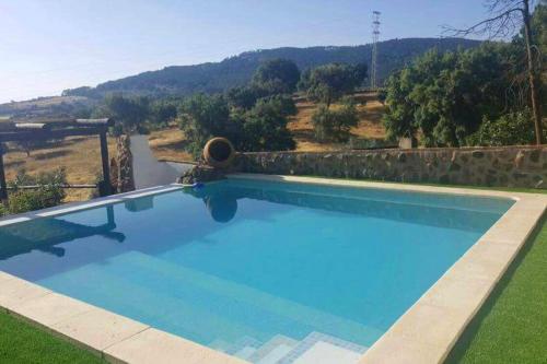 المسبح في 3 bedrooms villa with private pool enclosed garden and wifi at Monesterio أو بالجوار