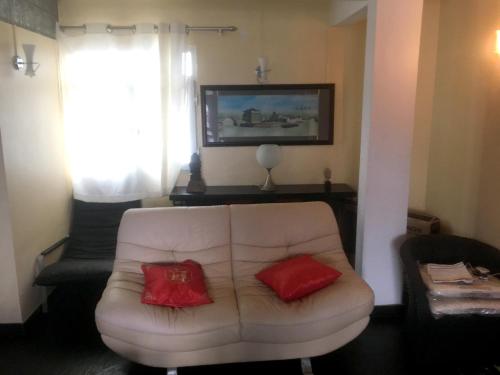 A seating area at 2 bedrooms appartement with city view furnished terrace and wifi at Bel Air 6 km away from the beach