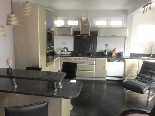 A kitchen or kitchenette at 2 bedrooms appartement with city view furnished terrace and wifi at Bel Air 6 km away from the beach