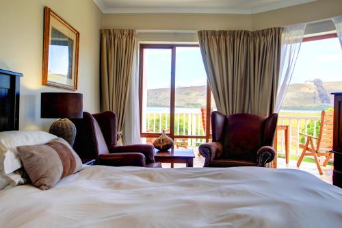 Katil atau katil-katil dalam bilik di Waterfront Lodge