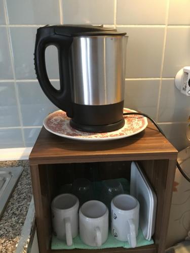 Coffee and tea making facilities at China-Ferienzimmer