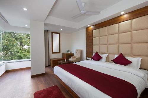 Katil atau katil-katil dalam bilik di Hotel Wild Wood