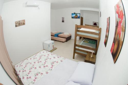 Кровать или кровати в номере Pousada Casa Verde