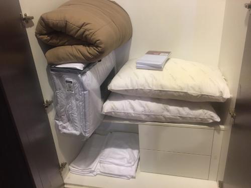 Ένα ή περισσότερα κρεβάτια σε δωμάτιο στο Bluroc Hua Hin Apartment